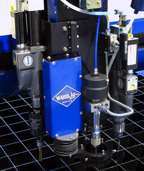 Multiple Tools Installed on a Single WARDJet Waterjet Z-Carriage